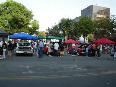 Even more people gather around